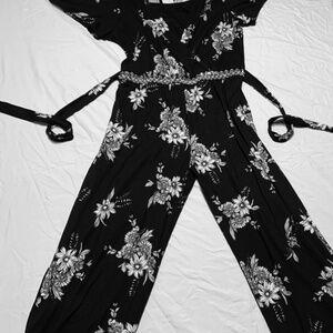 Gorgeous romper! This is perfect for your tween! Rhinestone detail at the waist!